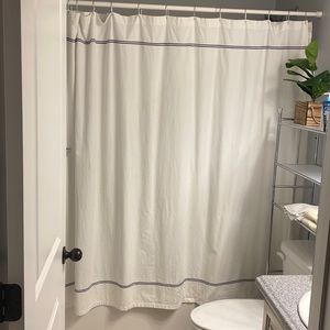 White with navy blue stripe detail